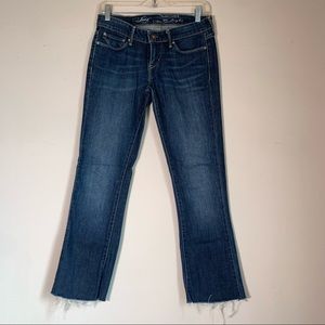 Levi’s slight curve skinny boot cut low rise jeans SZ 26 rough cut hem like new